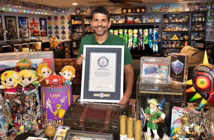 Coz holding his certificate