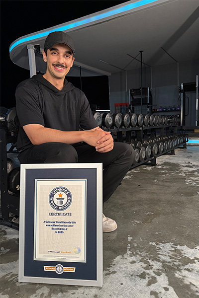 Tareq with his certificate