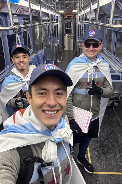 Group selfie wearing their flags