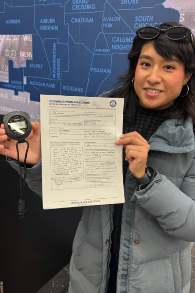 A witness holding the group's GWR report