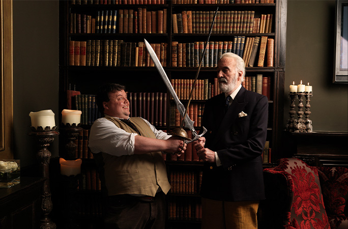 Craig Glenday sword fighting with Sir Christoper Lee