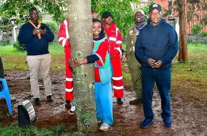 Truphena surrounded by crowd