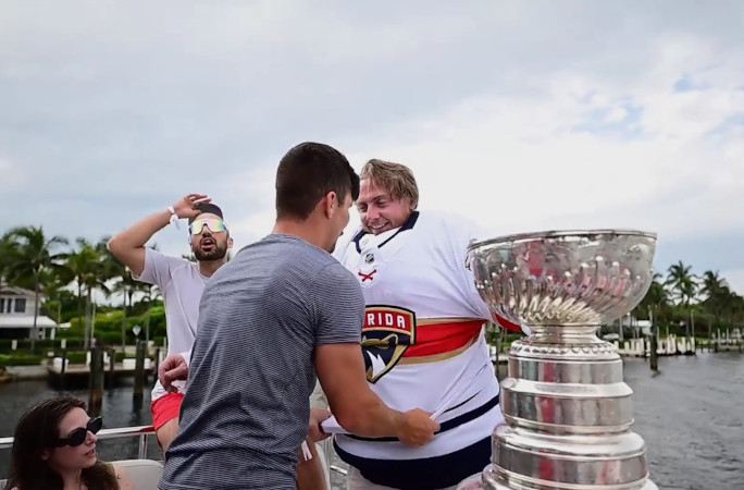 Dakota putting on the goalie jersey