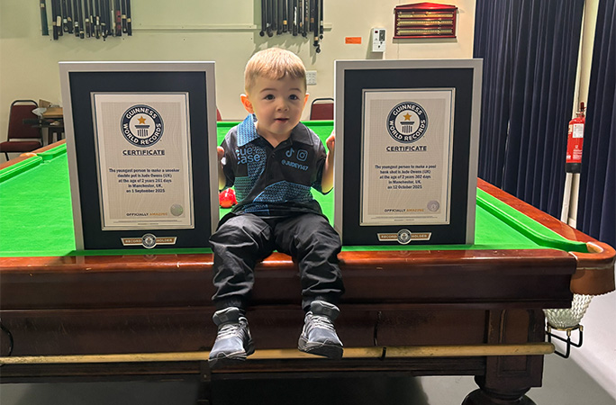 Jude with his certificates