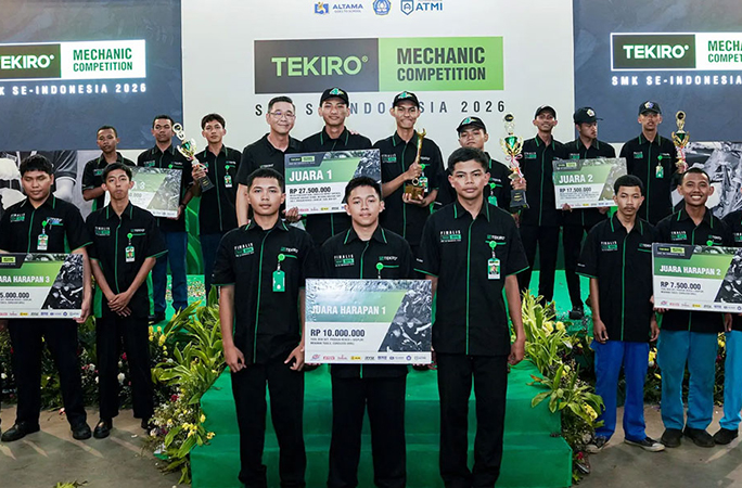 Students celebrating their record for largest automotive mechanic competition