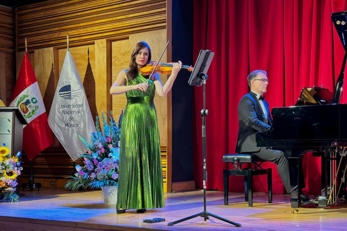 Diana and Stefan performing onstage