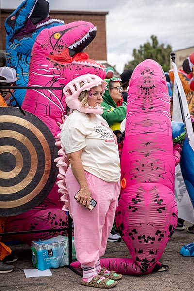 Participants in the largest gathering of people dressed as dinosaurs