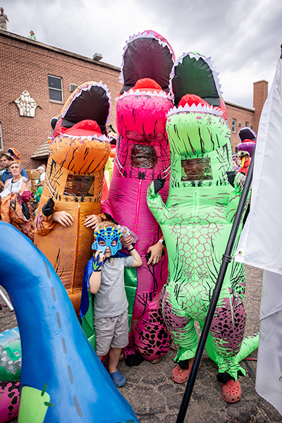 Participants in the largest gathering of people dressed as dinosaurs