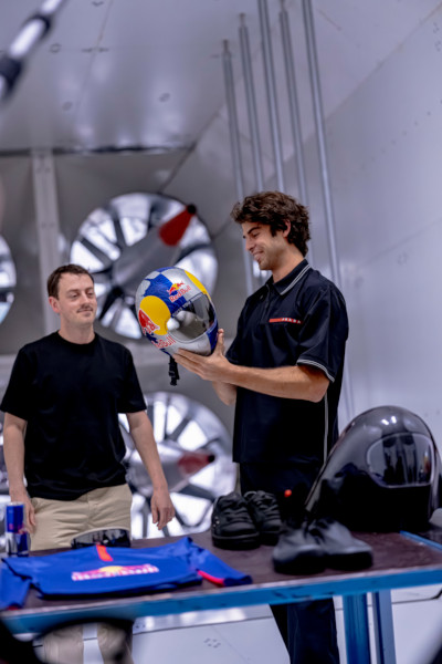 Diego holding his Redbull helmet