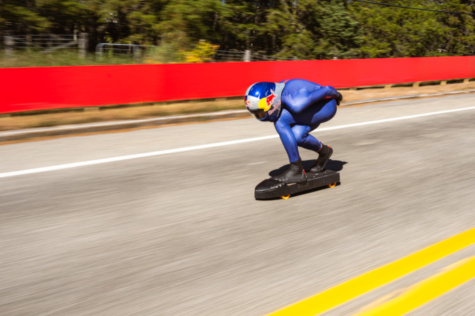 Diego midattempt with a clear shot of his suit and skateboard