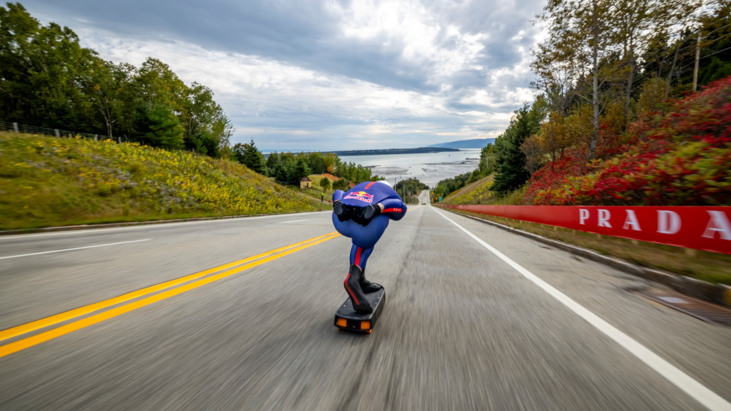 Split image of Diego going downhill on his skateboard, and Diego holding his GWR certificate next to the Redbull speed sign