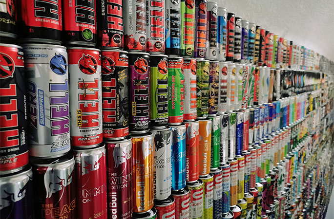 rows of energy drink cans