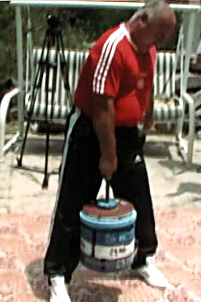Benik doing a deadlift with one finger