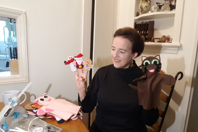 Cheralyn with finger puppets on her fingers