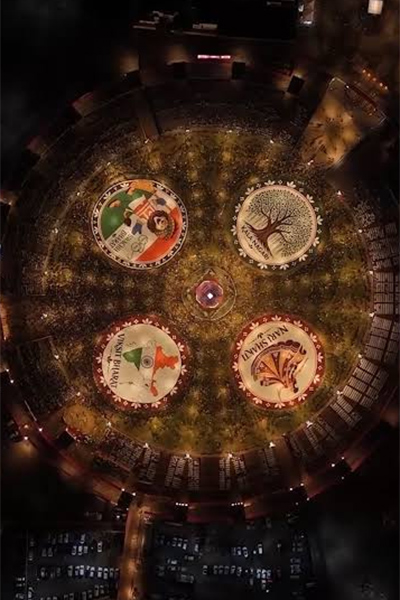 Aerial view of the gabra dance, showing four enormous circles of dancers