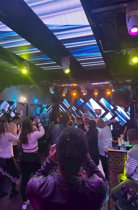 Illumi performing in club