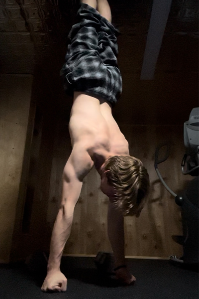 Madden doing a knuckle handstand