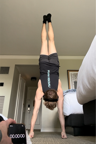 Madden doing a knuckle handstand