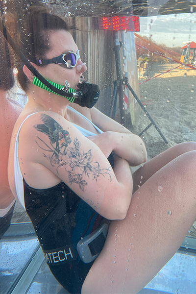 Maria submerged in ice water