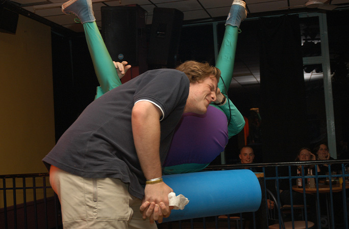 Mr Methane on stage with a man