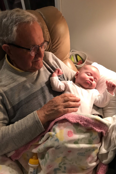 Normand holding baby Madison