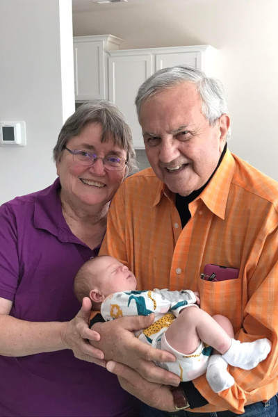 Normand and his wife holding baby Madison