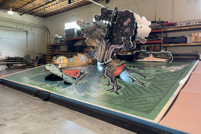 The pop up book's tree page on display in a warehouse