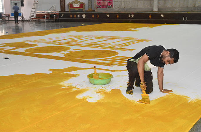 Amar making the painting