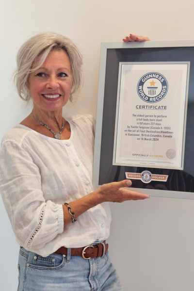 Yvette holding her GWR certificate