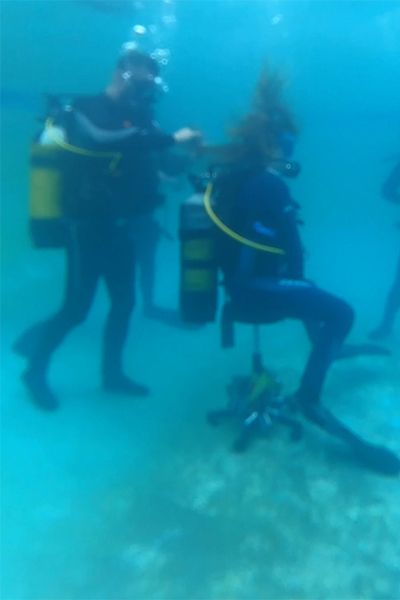 Andre doing a haircut under water