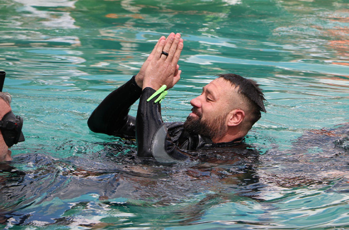 Andre celebrating in the water