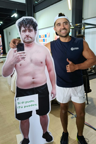 Enrique with a cardboard cutout of himself