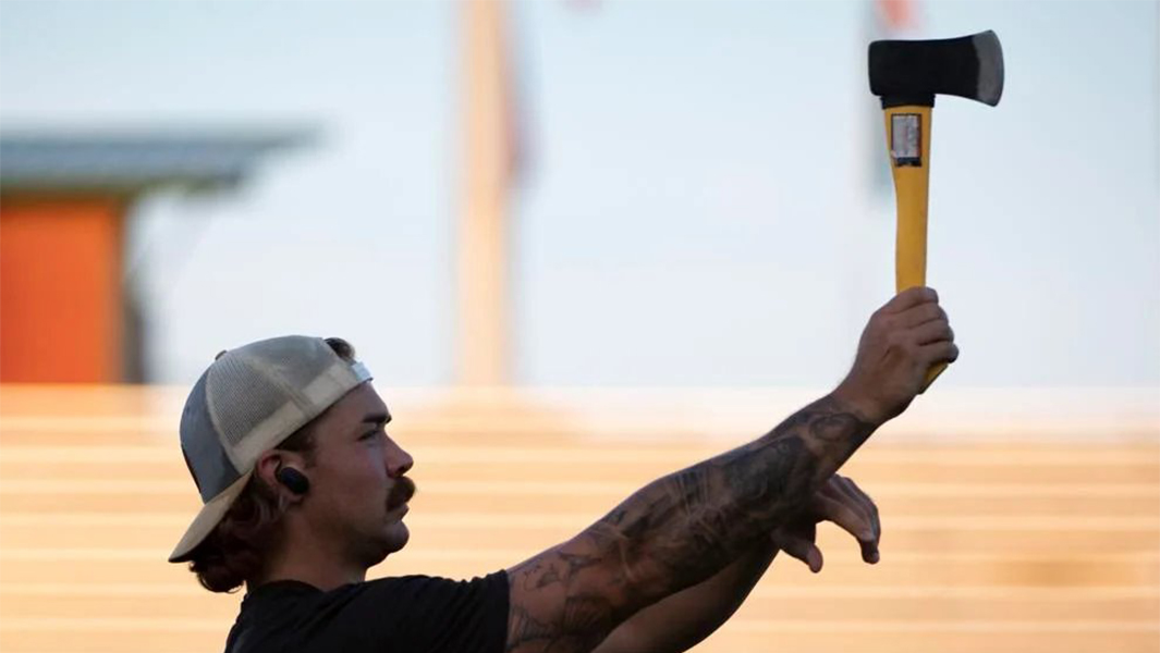 Jesse Rood throwing an axe