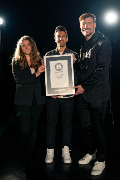 Jon and MrBeast holding GWR certificate