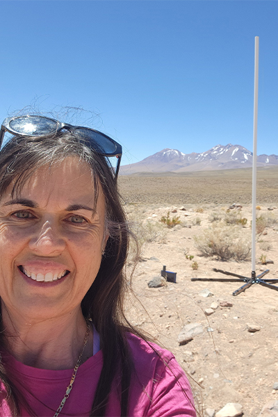 Fiona posing in front of the pole
