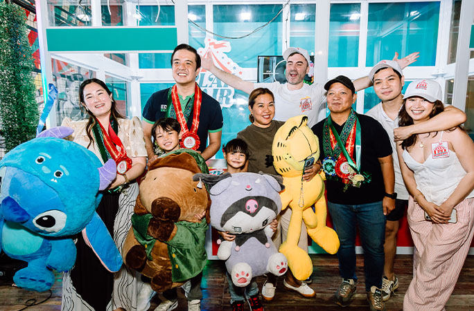 winners with giant toys