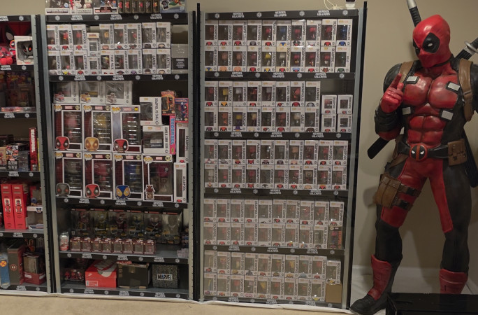 Greg's funko pops and Deadpool sculpture