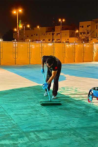 Zakir working on the painting