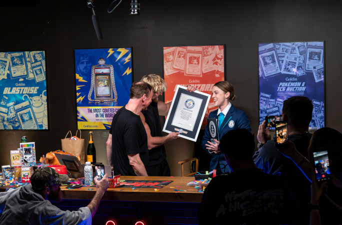 Logan looking at the GWR certificate