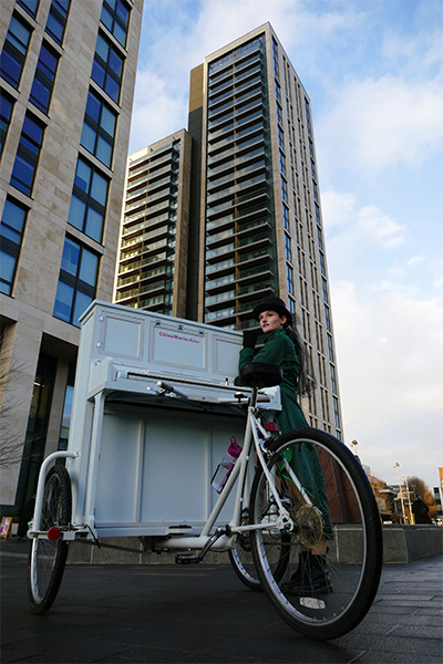 Chloe outside a block of flats