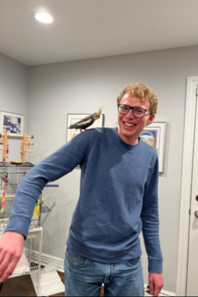 Sonny on older Sam's shoulder