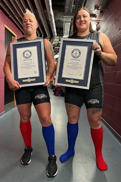 two women holding GWR certificates