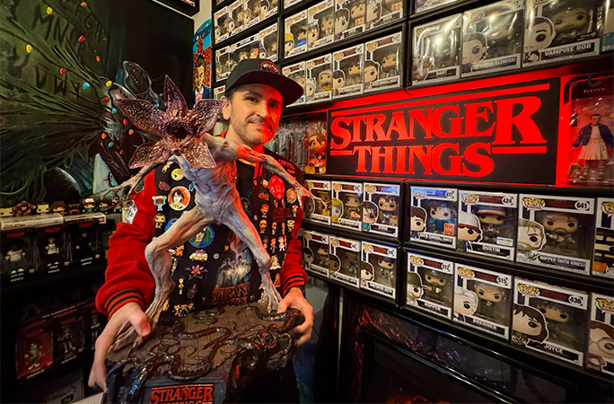 Joey holding demogorgon statue