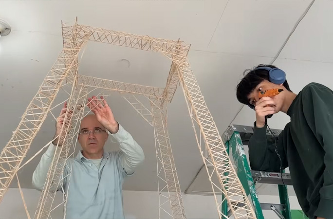 Eric and dad building