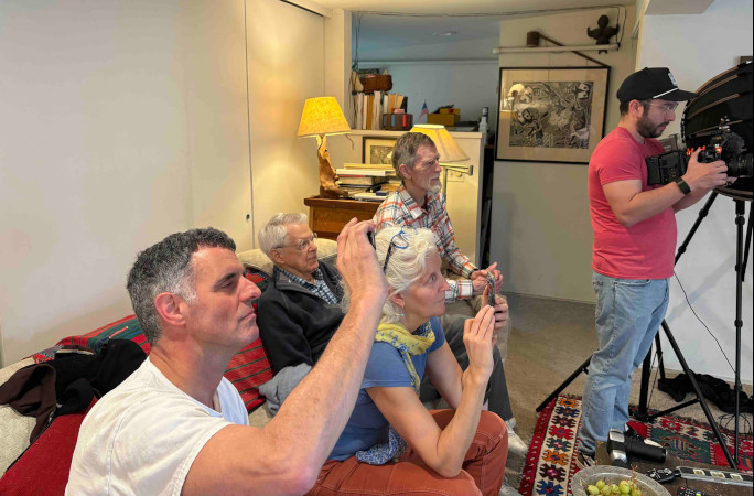 Ann's family watching her attempt