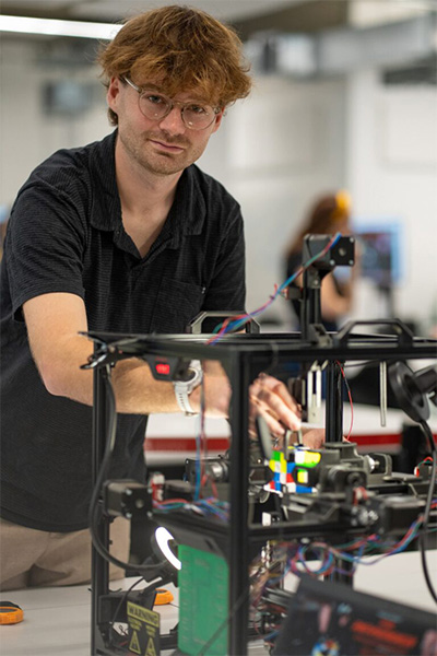 putting cube into the machine