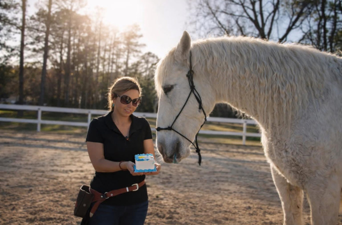 Lauryn giving Gringo his cake