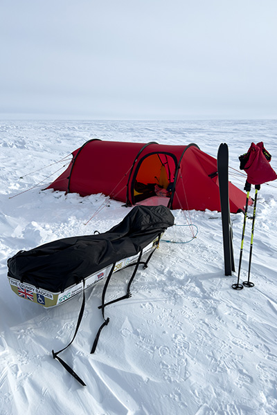 jonny-huntington-camp-with-his-pulk-named-the-grumpy-badger-based-on-a-pub-name-invented-at-uni