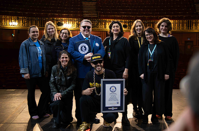 MC Grammar and team with certificate