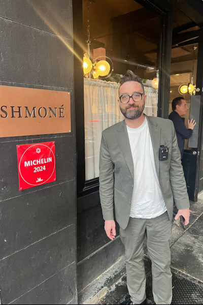 Josh outside Shmone restaurant